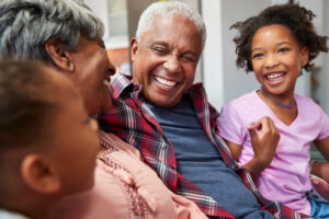 Grandparents happily spending time with grandkids