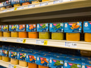 prepackaged baby food on grocery store shelf